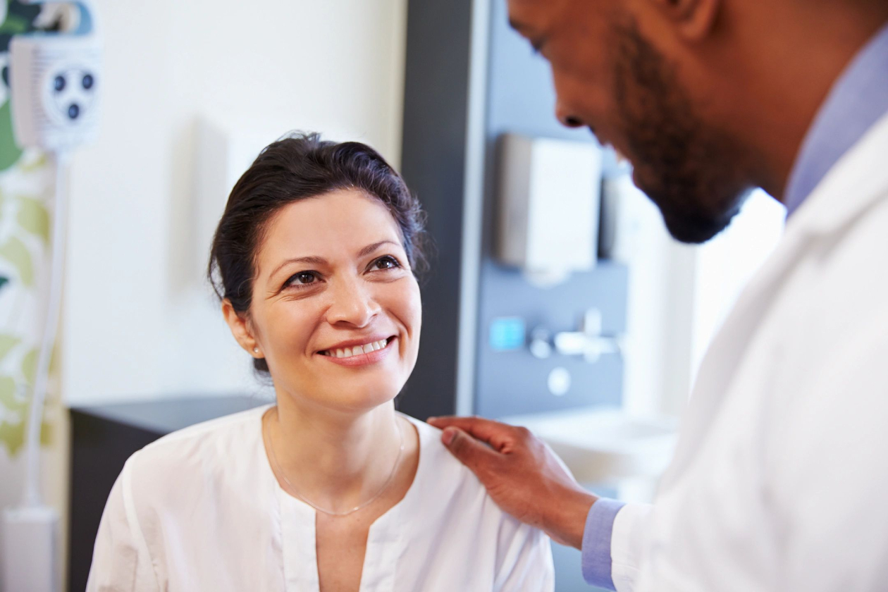 Doctor consoling female patient for Functional Medicine | Integrative Therapeutics